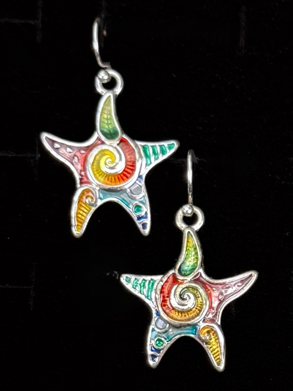 Pretty silvertone, multicolored star fish pierced earrings